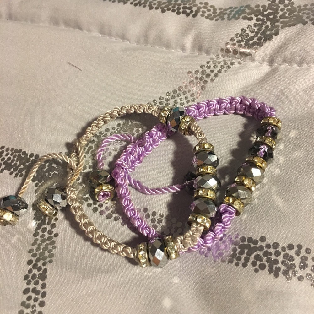 Silver and light purple bracelets